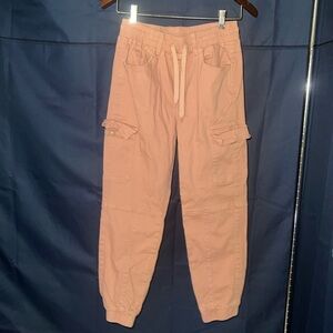 Blush pink tight ankle cargo joggers